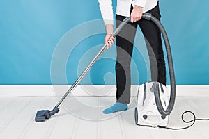 Man with vacuum cleaner