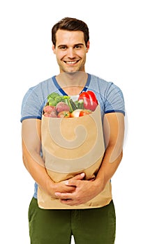 Man With Vegetables Bag Over White Background