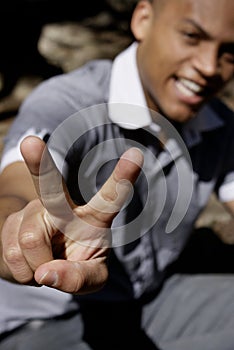 Man with victory fingers