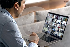 Man in a video conference with his team