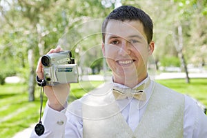 Man with videocamera photo