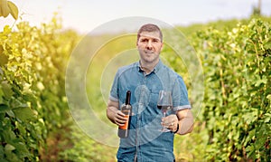 Man at vineyard welcoming tourists - Wine tasting tours in a vineyard