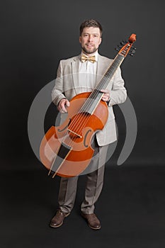 Man with a viola da gamba photo