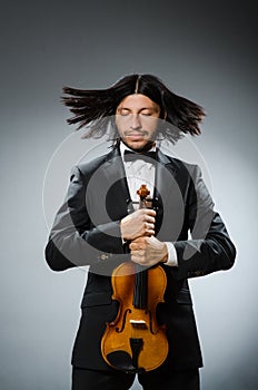 Man violin player in musican