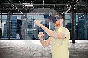 Man in virtual reality headset or 3d glasses