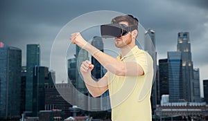 Man in virtual reality headset or 3d glasses