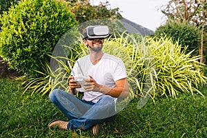 A man in a virtual reality helmet