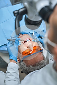 Man during visit to dentist stock photo