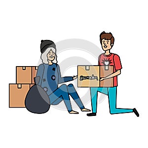 Man volunteer giving a homeless woman donations box