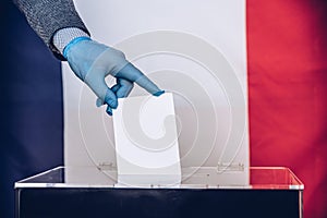 Man voting on elections in france during pandemic.