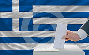 Man voting on elections in greece photo