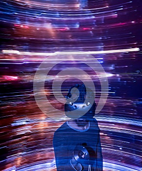 Man in VR glasses on dynamic speedy abstract background