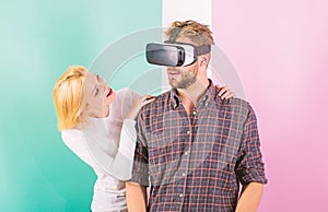 Man VR glasses enjoy video game. Girl happy he like her gift. Gift ideas for men. Make him happy gift him virtual