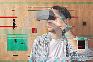 Man with VR goggles exploring virtual reality econtent