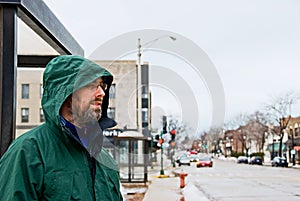 Man waiting at bus stop