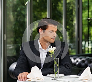 Man waiting someone in restaurant