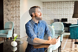 Man waiting for woman in restaurant