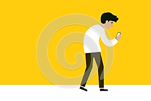 A man walk as using mobile phone