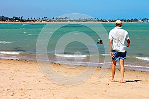 Man walking on Beach