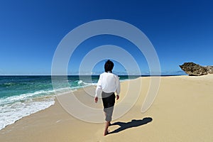 Man walking on beach