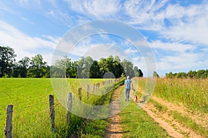 Man walking the dog in French Limousin photo