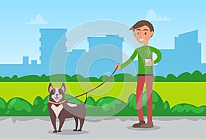 Man Walking Dog on Leash in City Park