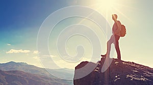 Man walking on the edge of a cliff