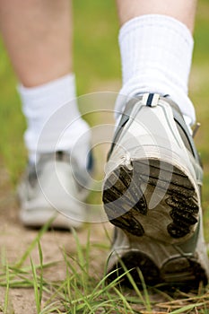 Man walking on hiking trail