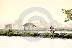 Man walking with his bike