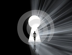 Man walking into a keyhole photo