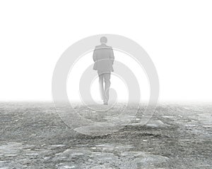 Man walking in mist on dirty concrete floor