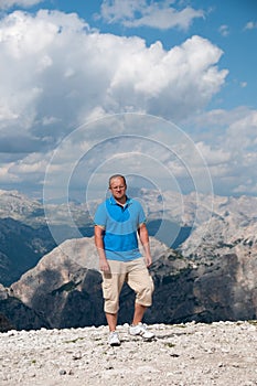 Man walking on a road in italian mountains