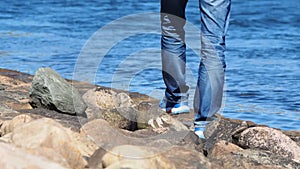 Man walking on seaside