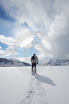 Man Walking On Snow