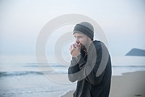 Man walking in solitude at the beach