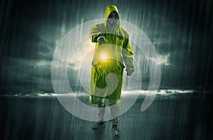 Man walking in storm with lantern