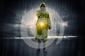 Man walking in storm with lantern