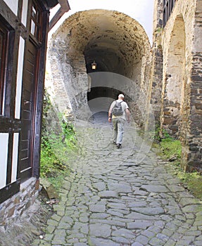 Man walks through a corridor
