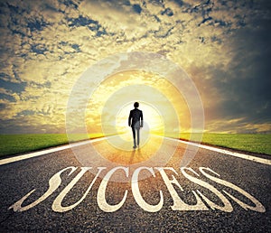 Man walks on a success way. Concept of successful businessman and company startup