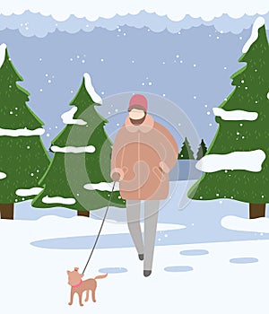 Man in warm clothes walks with pet in winter forest. Evergreen coniferous trees, spruce, snow cover