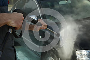 A man washes a car Clear car concept