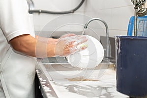 Man washing dish