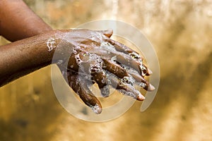A man washing his hands by soap to maintain hygiene.stay healthy.avoid germ and virus.