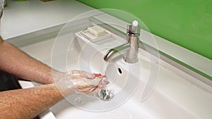 Man washing his Hands to prevent virus infection and clean dirty hands