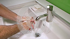 Man washing his Hands to prevent virus infection and clean dirty hands