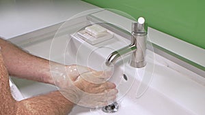 Man washing his Hands to prevent virus infection and clean dirty hands