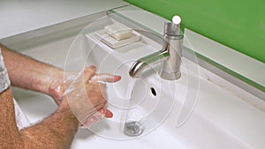 Man washing his Hands to prevent virus infection and clean dirty hands