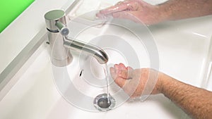 Man washing his Hands to prevent virus infection and clean dirty hands