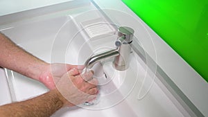 Man washing his Hands to prevent virus infection and clean dirty hands