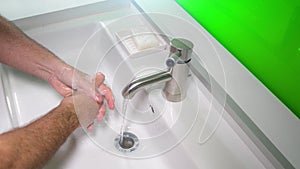 Man washing his Hands to prevent virus infection and clean dirty hands